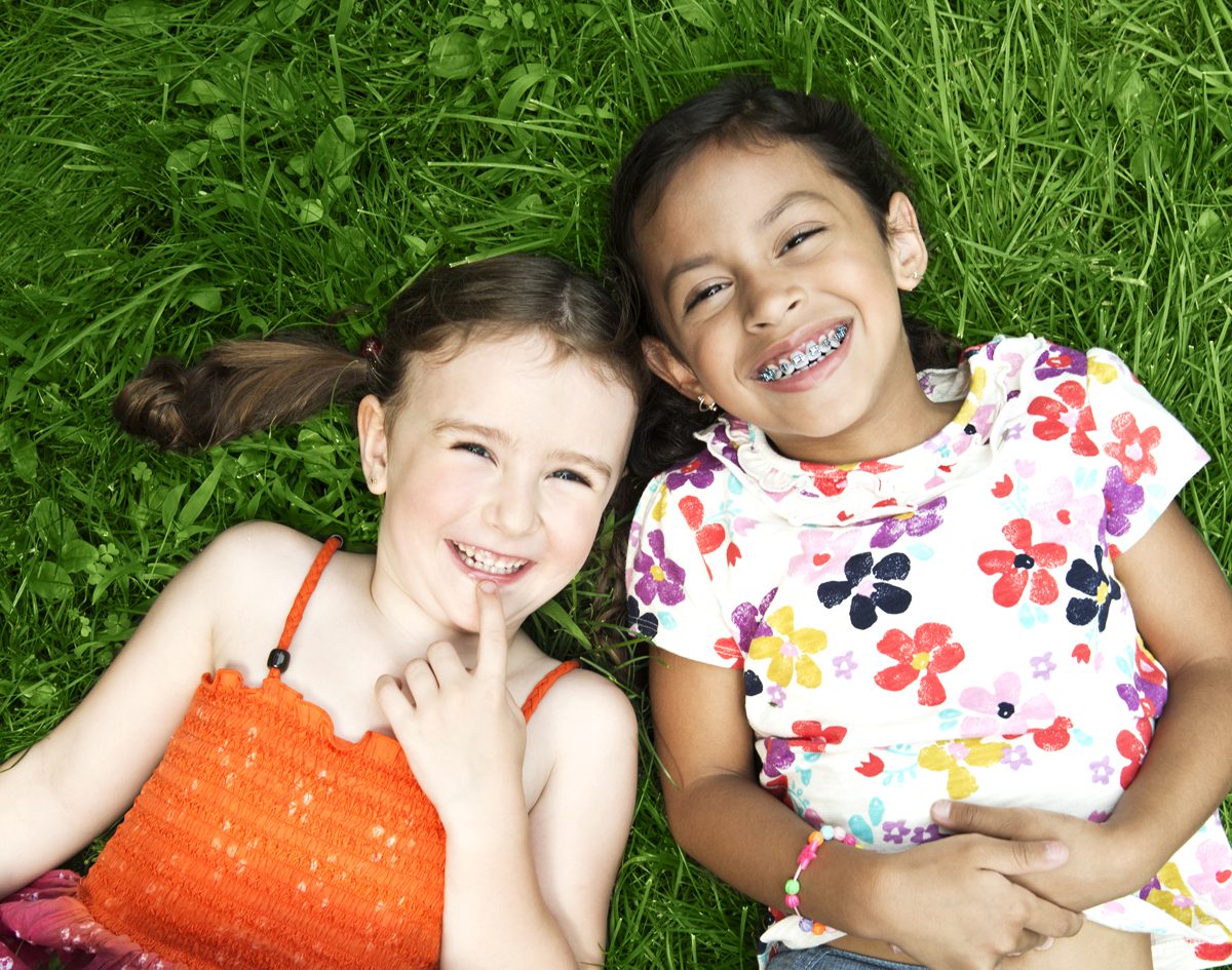 two-girls-smiling-brightened